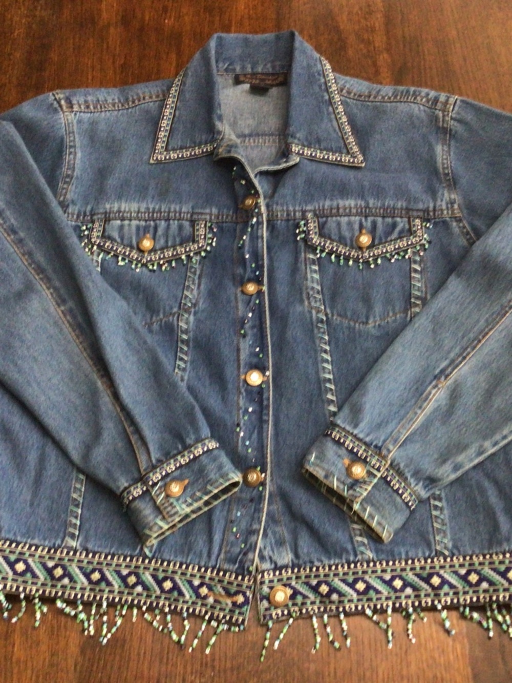 New Direction denim jacket with beaded trim. Size medium. Good shape.